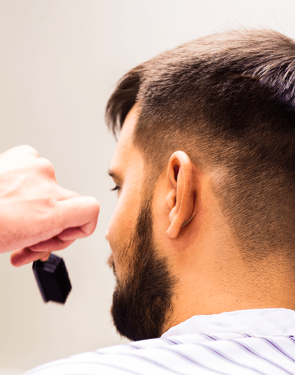 Model potongan rambut mid fade Voolcut Barbershop